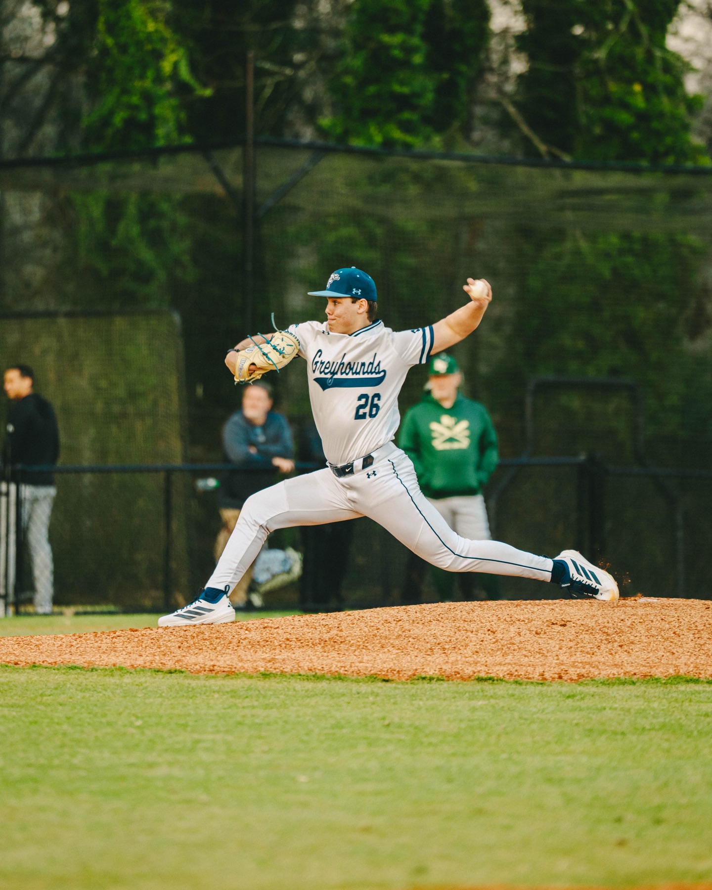 Pitcher delivering a pitch