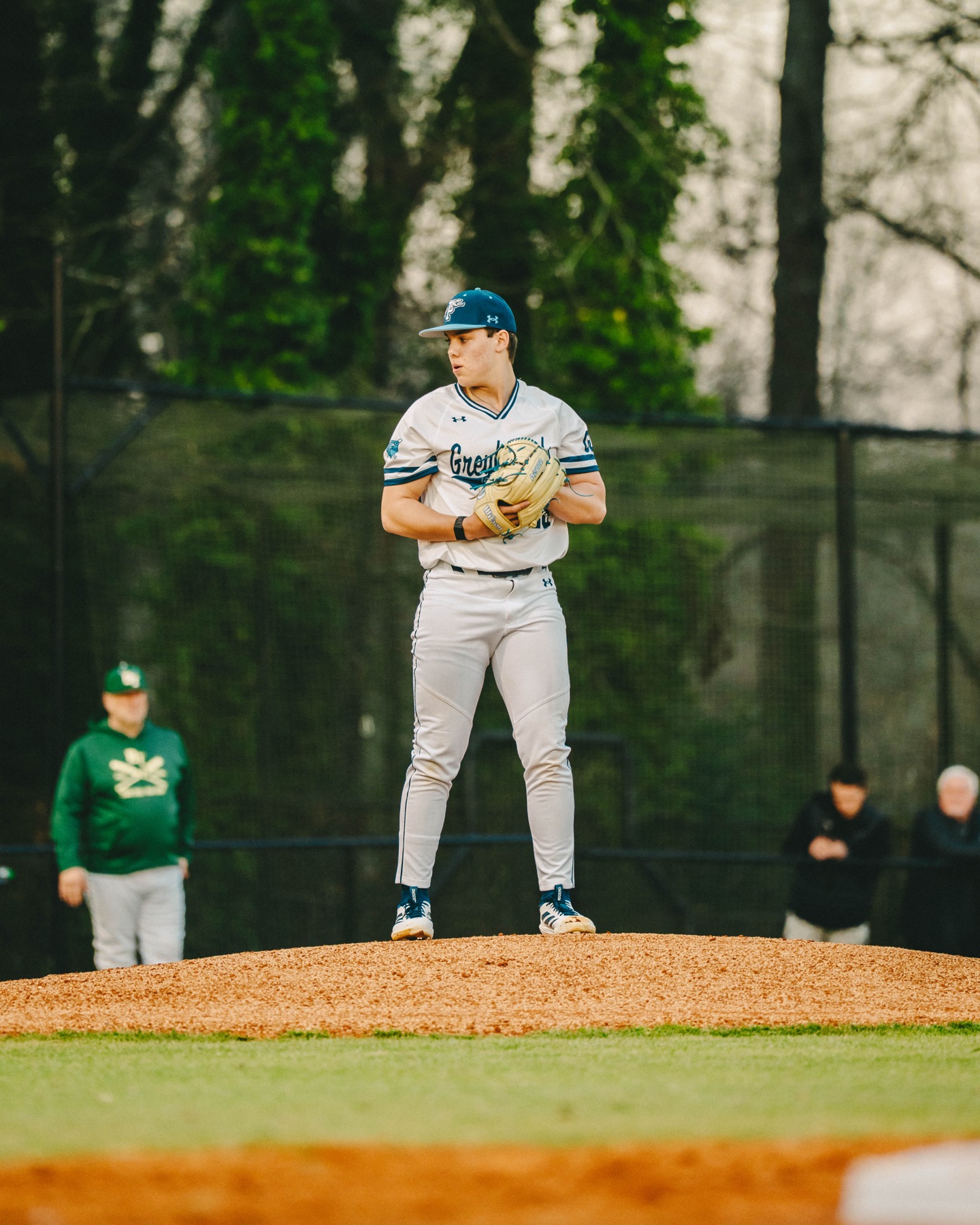 Pitcher preparing on the mound