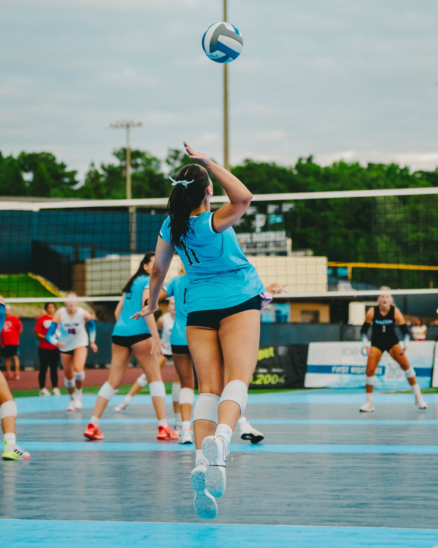 Volleyball player serving