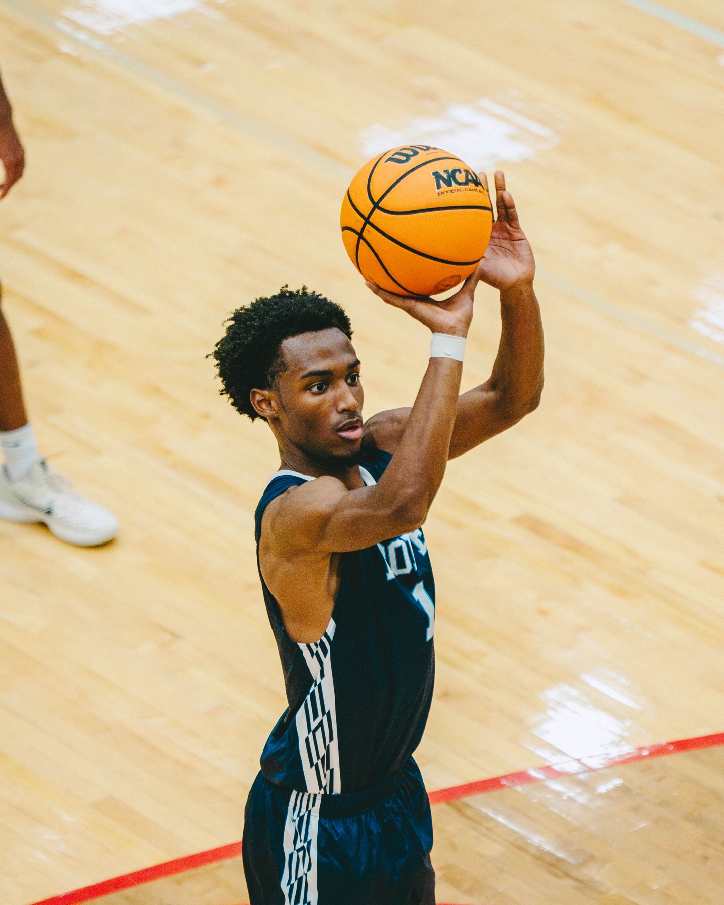 Basketball player lining up a shot