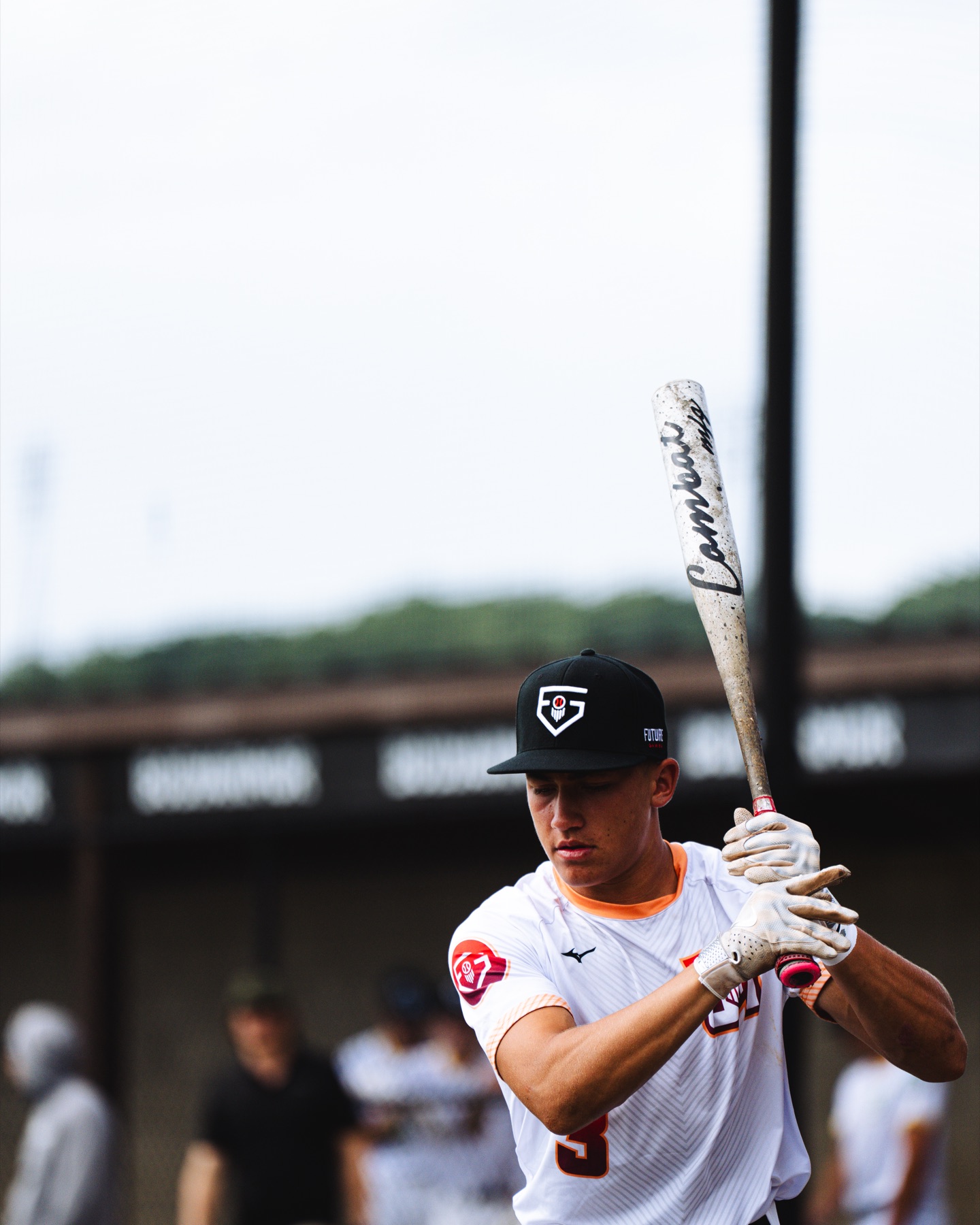 Baseball batter preparing at the plate